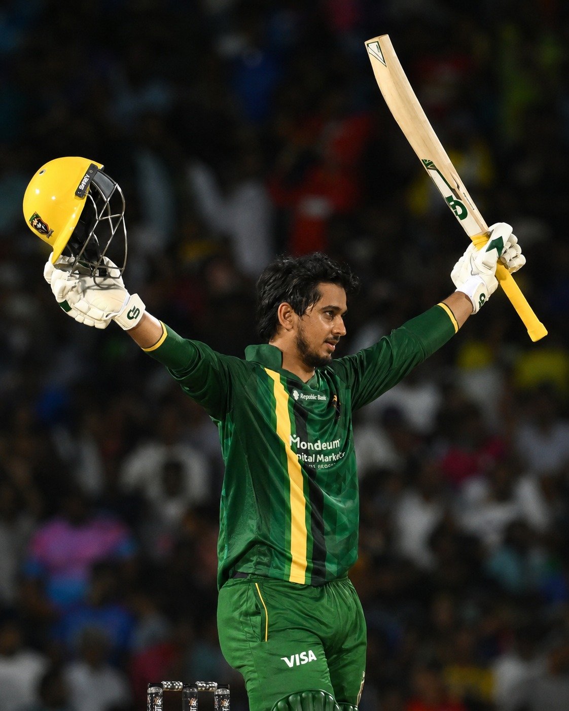 Saim Ayub celebrates his maiden T20 century for Jamaica Kingsmen